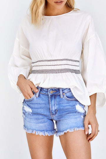 Magazine Medium Rise Distressed Denim Cutoffs