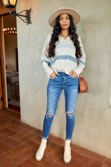 Torin Mid Rise Distressed Skinny Jean