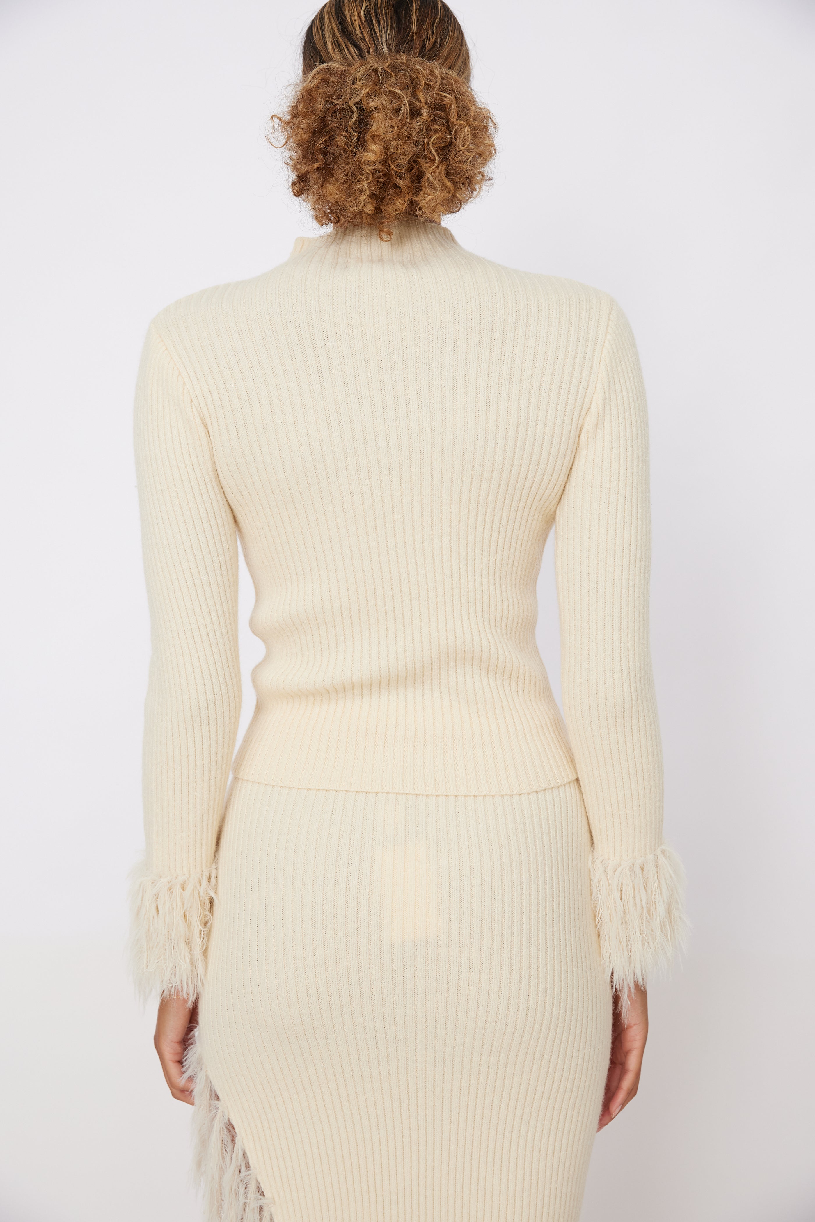 Zach Feathered Fringe Mock Neck Sweater